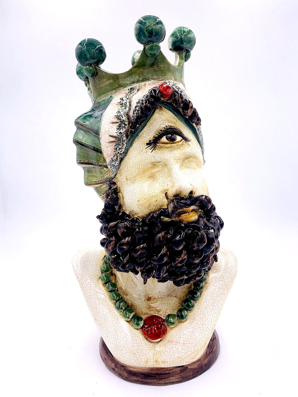 A Plifemo hand made vase with a beard and crown. -*- Ceramic. Sicily, Italy.