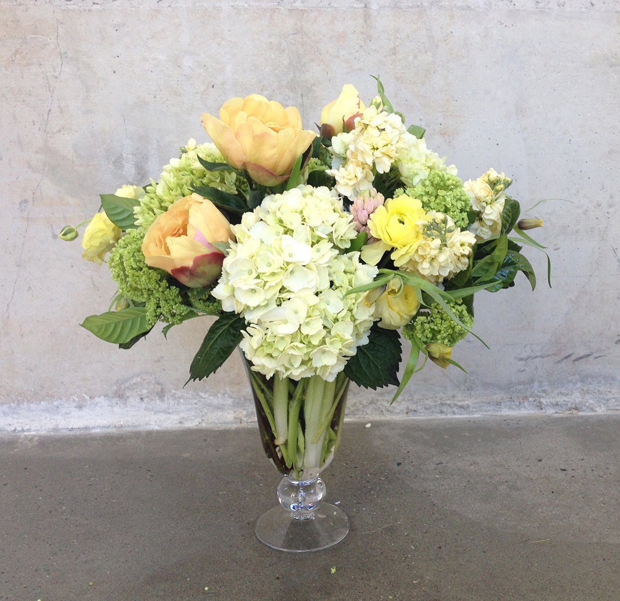 Arrangement of COLORFUL flowers in a glass vase from TAKAYASATO.COM.