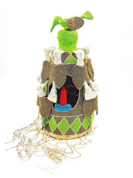A small basket with a Colorful Yoruba King Crown. Beaded. Africa on it from TAKAYASATO.COM