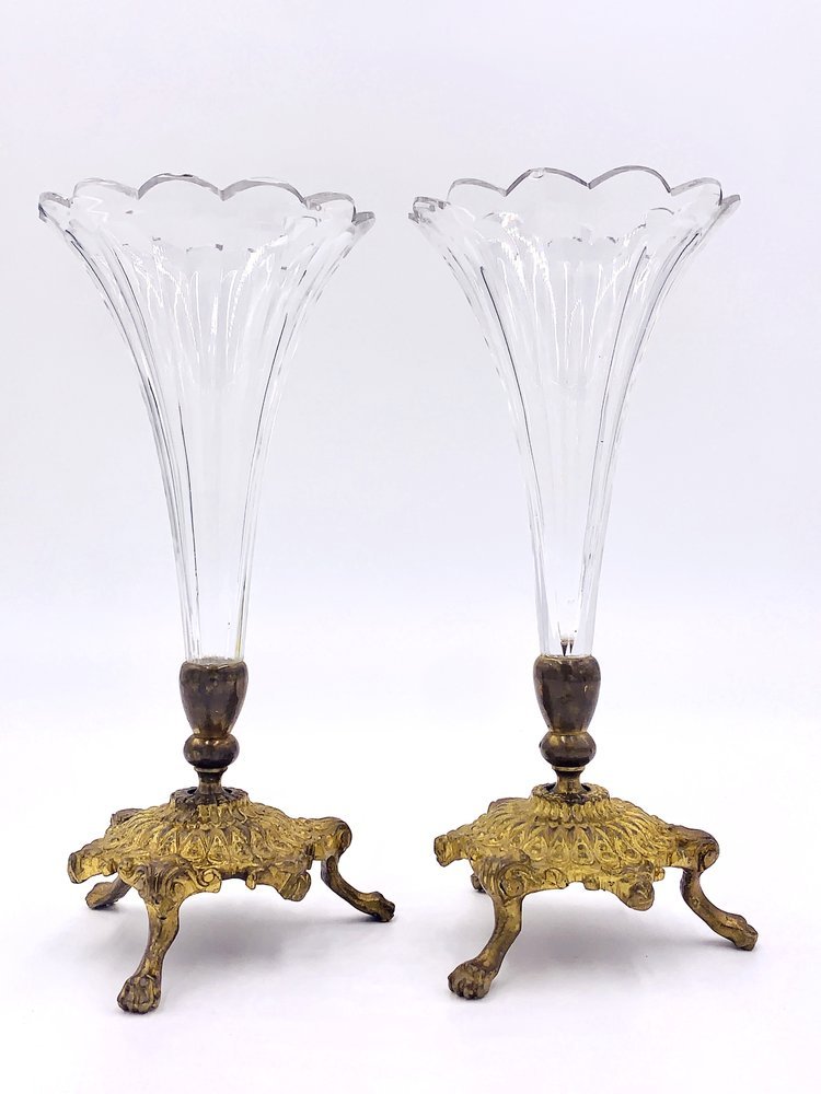 A pair of Fotted vases. Brass and Crystal on a white background by TAKAYASATO.COM.