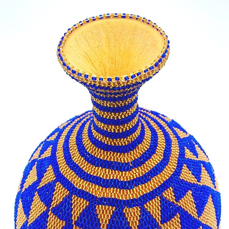 A pair of blue and yellow beaded decorative vases from TAKAYASATO.COM on a white surface