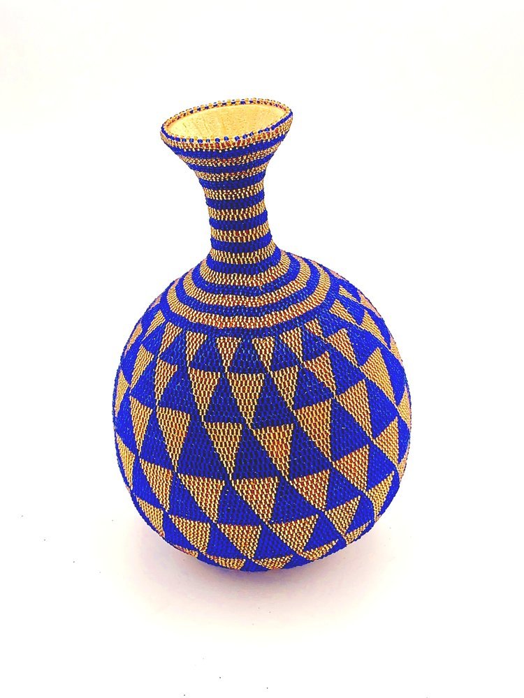A pair of blue and yellow beaded decorative vases by TAKAYASATO.COM on a white surface