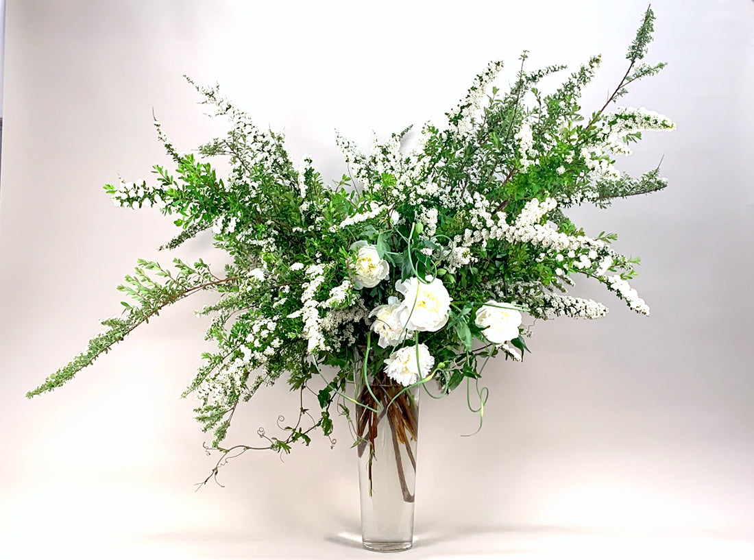 A beautiful arrangement of WHITE,GREEN & HERBS flowers and greenery in a vase from TAKAYASATO.COM.