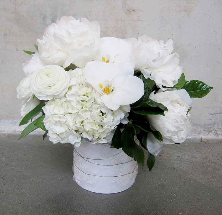 A beautiful arrangement of White, Green & Herbs peonies and hydrangeas in a vase from Takayasato.com.