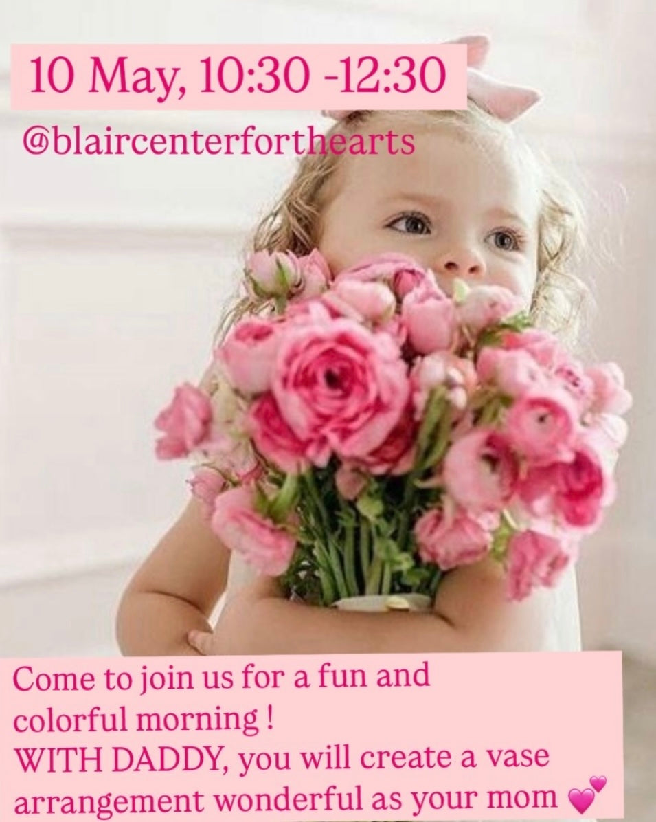  Father and child creating a flower arrangement together at the Daddy & Me Flower Workshop