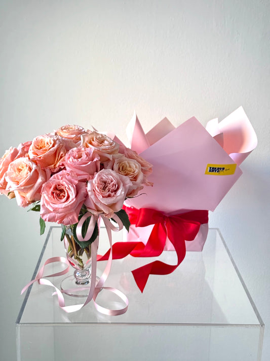 Sexy Pink Valentine’s floral arrangement in an elegant gift box with vibrant roses and romantic blooms