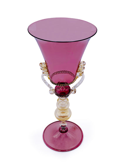 A pink Murano Borgogna goblet on a white background by TAKAYASATO.COM.