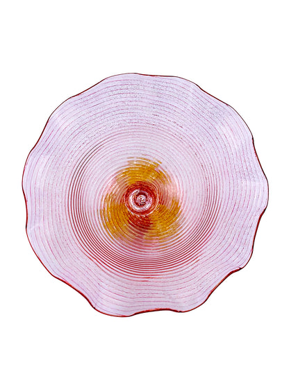 A handcrafted Murano Coppetta Rosa plate with a red and yellow design from TAKAYASATO.COM.