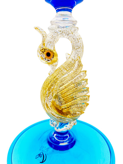 This handcrafted Murano Domino Turchese glass pipe features a gold swan, reminiscent of Venice's Murano glass craftsmanship by TAKAYASATO.COM.