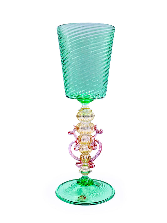 A handcrafted Murano Smeraldo glass goblet with a pink and green design by TAKAYASATO.COM.