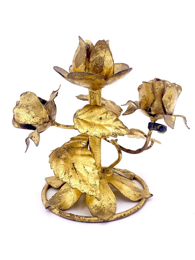 A Pair of Brass Candle Holders with leaves and flowers from TAKAYASATO.COM.